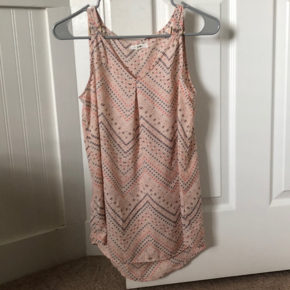 Pink tank top with designs